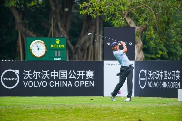 Dianchao Wu hitting a golf shot at the 2021 Volvo China Open